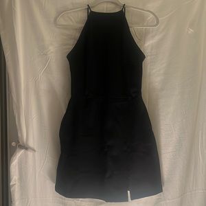 Black dress with straps and small slit on the side